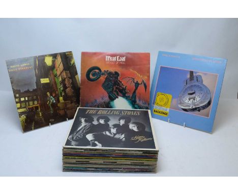 A collection of rock and pop LPs, artists to include: The Rolling Stones; Meat Loaf; The Beatles; Marillion; Foreigner; Rainb