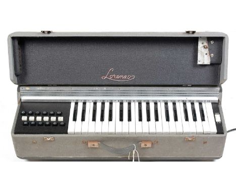 A vintage Lorenzo portable organ, with 22 white keys, in integral case (legs missing).
