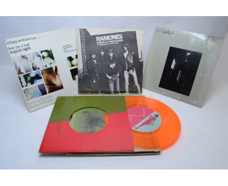 A collection of punk and New Wave LPs and 12" singles, artists to include: Pink Military; Magazine; Warsaw; The Pirates; Siou