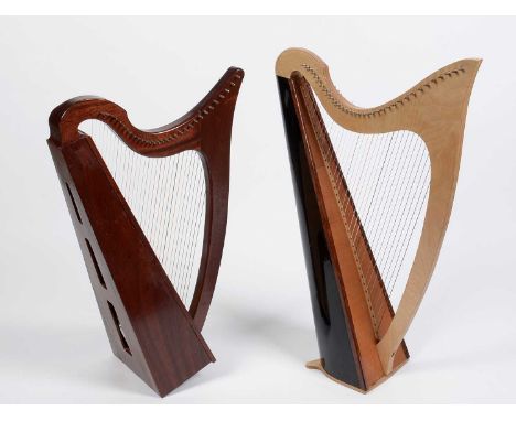 A mahogany framed Celtic style harp, with fine-grained spruce soundboard, fitted with 31 strings, soft case; another small Ce