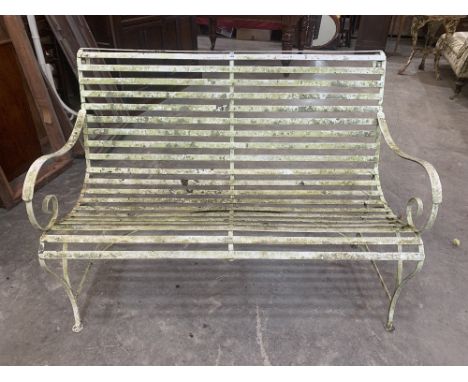 A metal slatted garden seat with scrolled arms. 49' wide