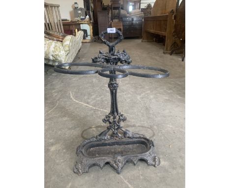 A Victorian cast iron Coalbrookdale style stickstand. 28½' high. Screw on stick support lacking on one side