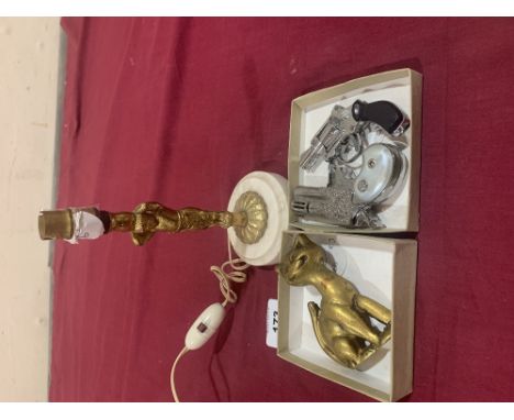 A small gilt metal figural lamp base, novelty lighter etc.