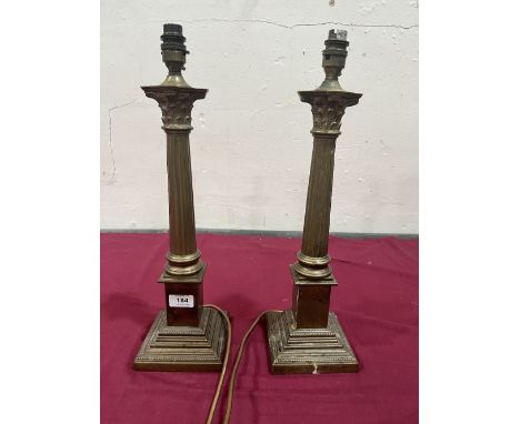 A pair of Laura Ashley brass corinthian table lamp bases. 16' high