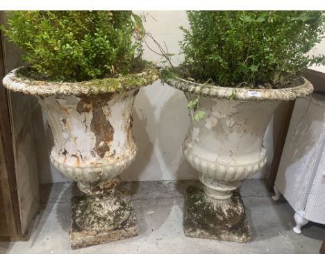 Garden Ornament. A pair of 19th century cast iron campana urns. 29½' high