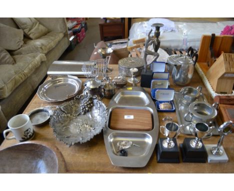 A quantity of metalware to include decanter labels; spot hammered tea set; a Novelty hip flask etc. 