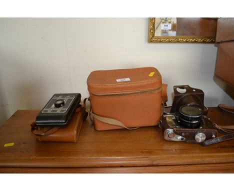 A Fuji camera and a Kodak camera