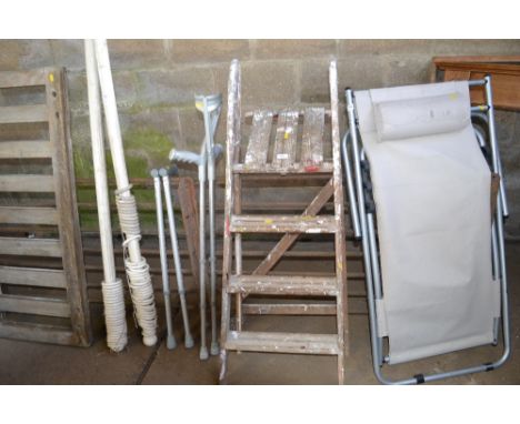 A wooden step ladder 