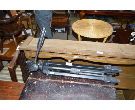 A camera tripod stand 