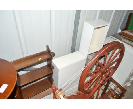 A mahogany three tier wall shelf; two white painted cabinets; and a white painted wall shelf