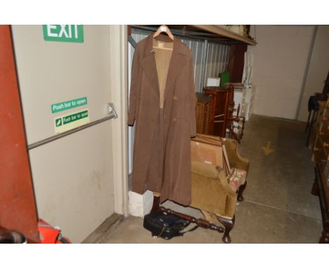 A lady's coat, handbag and purse etc. 