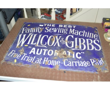A "The Best Family Sewing Machine, Willcox &amp; Gibbs Automatic" enamel advertising sign AF