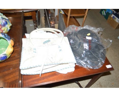 A lady's hide handbag and two lady's hats