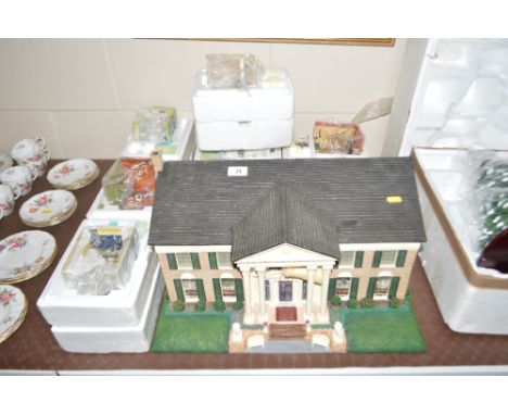 A model of Elvis Presley's mansion at Graceland with accessories 