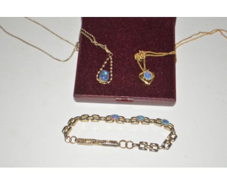 Two opal pendants, each hung to fine link chains; and an opal set bracelet