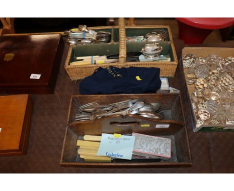 An antique cutlery tray and contents of various plated cutlery; a wicker cutlery tray and contents to include Ronson cigarett