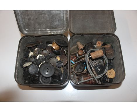 Two boxes containing various tins, scent bottle, miniature lighter etc. 