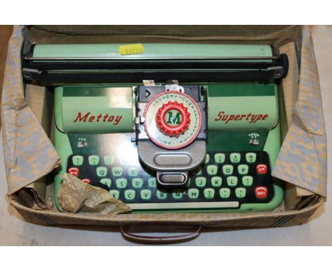 A Mettoy Super Type child's typewriter in original box