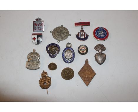 A box of various enamel decorated and other badges including ARP