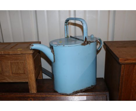 A large enamel country house watering can