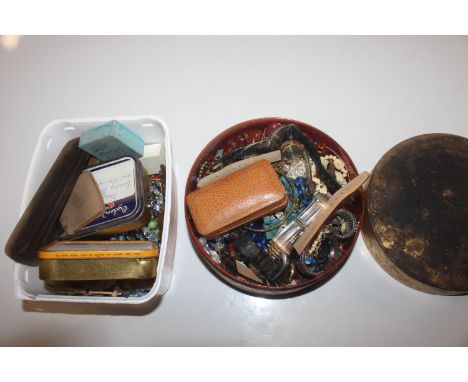 A box containing various costume jewellery; wrist watches; cuff-links; dress studs; compact; a circular lacquered box contain