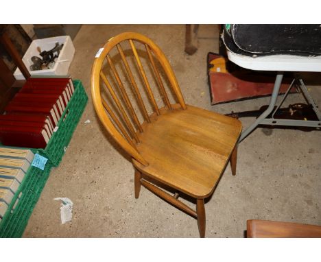 An Ercol style stick back kitchen chair