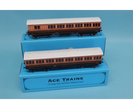 Four boxed Ace Trains railway coaches