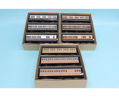Three boxed sets of three Ace Trains railway coaches, set number 6, LSWR, set number 8, 'Metropolitan' and set number 5, LNWR