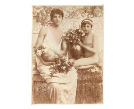 Wilhelm von Gloeden (1856-1931), vintage photo print on salted paper tack depicting "Young with flowers" in 1914. Stamp on th