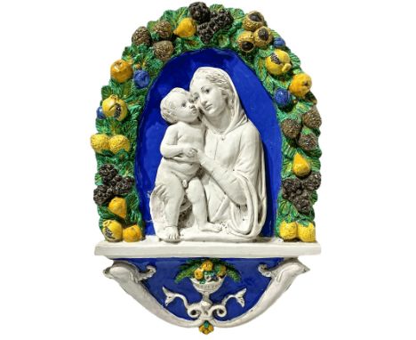 Majolica depicting Virgin Mary with child, the end of the nineteenth century. Copy of "Della Robbia". H 93 cm width 62 cm dep