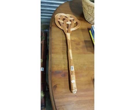 OLD WICKER CARPET BEATER