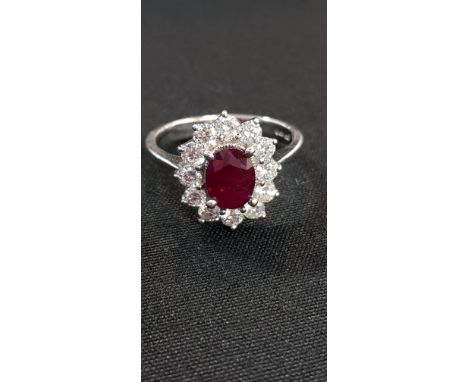 18CT WHITE GOLD RUBY AND DIAMOND RING WITH 1 CARAT OF DIAMONDS