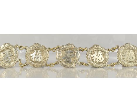 A Nicely Worked Chinese Export Cast Silver Belt, Buckle with Opposing Snarling Tiger and Dragon Decoration and with Fifteen A