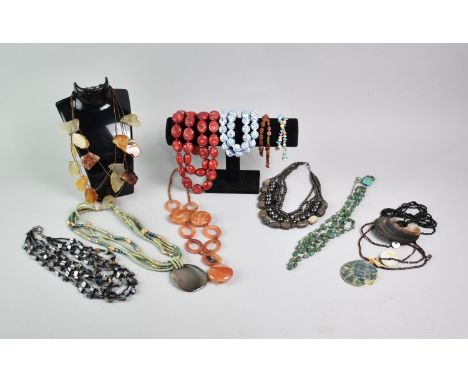 A Collection of Various Hardstone and Other Bead Necklaces to include Coral, Chinese Porcelain, Agate Etc