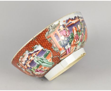 A Chinese Qing Dynasty Porcelain Bowl Decorated in the Famille Rose Palette with Figural Cartouches on Iron Red Scale Ground,