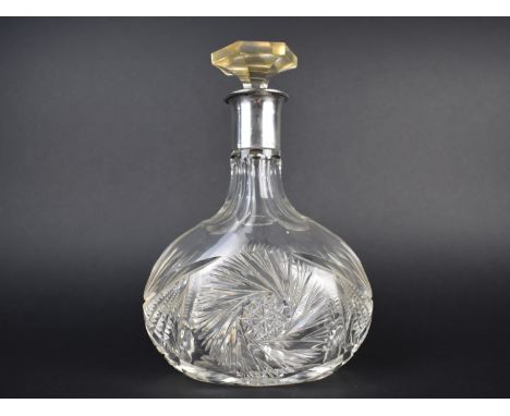 A Silver Collared Cut Glass Decanter, 24.5cms High