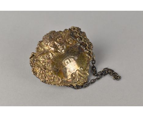 A Silver Decanter Label for Gin with Ornate Mask and Grape Vine Decoration, Birmingham Hallmark, 6x5.5cm