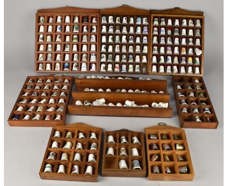 A Collection of Thimble Display Cases Containing Various Thimbles