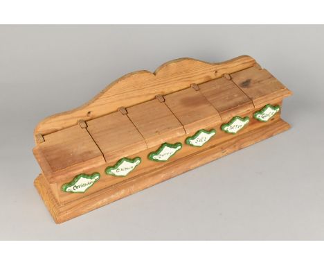 A Late 20th Century Pine Six Section Spice Box with Ceramic Labels, 48cms Wide