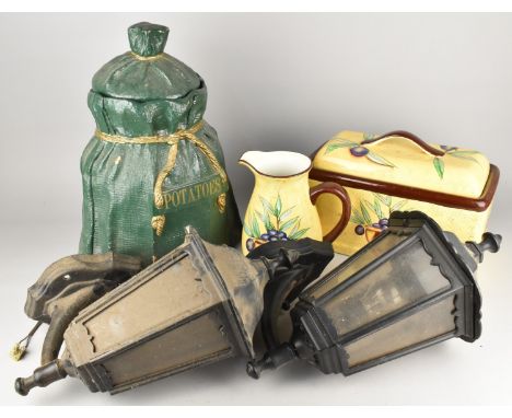 A Large Painted Terracotta Potatoes Pot and Cover, a Matching Ceramic Crock and Jug and Two Exterior Wall Lights