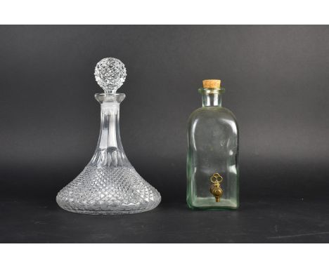 A Modern Moulded Glass Ships Decanter and a Rectangular Glass Bottle with Brass Tap