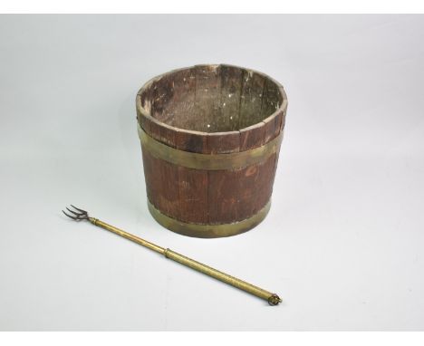 A Brass Bound Wooden Barrel Shaped Planter, 25cms Diameter and 22cms High together with an Extending Brass Handled Toasting F