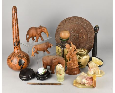 A Collection of Various Souvenir and Other Items to Comprise Carved Wooden Elephants, Lion, Charger, Leather Mounted Bottle, 