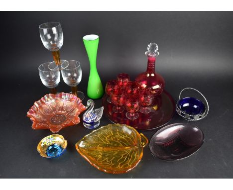A Collection of Various Coloured Glass to Comprise Scottish John Deacons Swan Paperweight, Cranberry Decanter Set etc