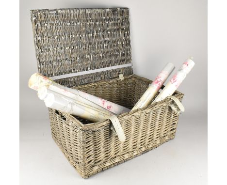 A Wicker Hamper Containing Four Rolls of Unused "Beatrice Cyclamen" Wallpaper and Two Used Examples
