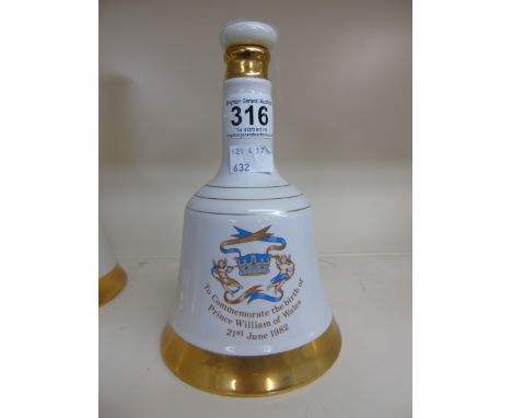 BELLS SCOTCH WHISKY COMMEMORATIVE DECANTER WITH CONTENTS 50 cc 40% VOL, CORK BROKEN IN NECK OF BOTTLE