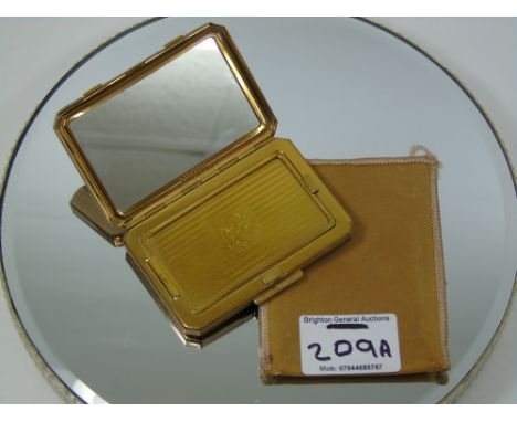 VINTAGE 1950s STRATTON POWDER COMPACT WITH RED CALIBRE-CUT RHINESTONES