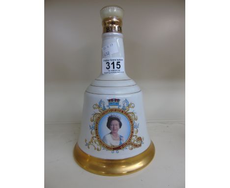 BELLS SCOTCH WHISKY COMMEMORATIVE DECANTER WITH CONTENTS , SEALED TOP 75 cl 43° GL