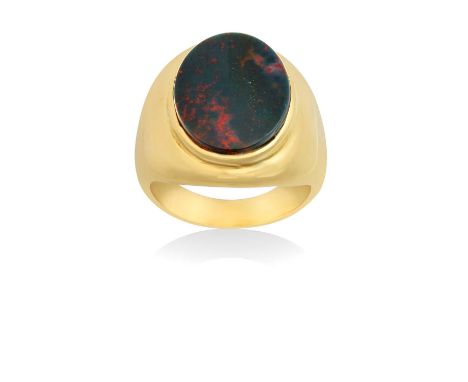 An 18 Carat Gold Bloodstone Signet Ringthe oval bloodstone plaque in a yellow rubbed over setting, to a tapered shoulder plai
