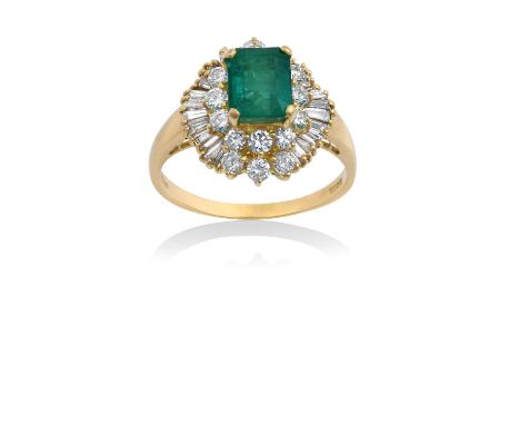 An 18 Carat Gold Emerald and Diamond Cluster Ringthe emerald-cut emerald within a border of round brilliant cut diamonds lead